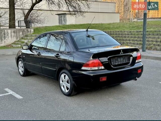 Мицубиси Лансер 2007 в Лубнах на Automoto.ua Черный Мицубиси Лансер, объемом двигателя 1.6 л и пробегом 280 тыс. км за 4250 $, фото 3 на Automoto.ua
