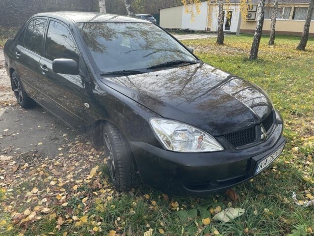 Міцубісі Lancer 2007 у Каневе на Automoto.ua Чорний Міцубісі Lancer, об'ємом двигуна 1.6 л та пробігом 310 тис. км за 4100 $, фото 7 на Automoto.ua
