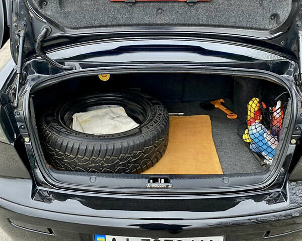 Черный Мицубиси Лансер, объемом двигателя 2 л и пробегом 164 тыс. км за 8300 $, фото 24 на Automoto.ua