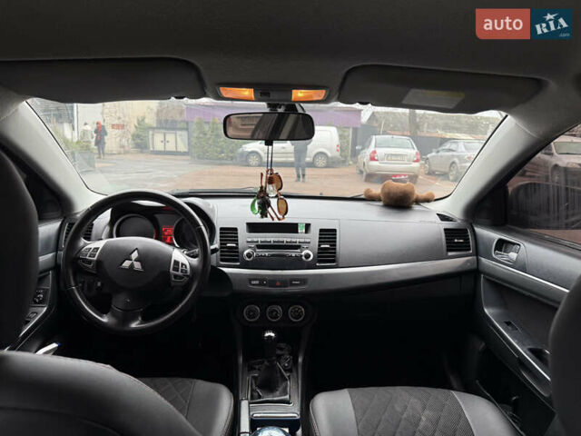 Чорний Міцубісі Lancer, об'ємом двигуна 2 л та пробігом 281 тис. км за 6000 $, фото 15 на Automoto.ua