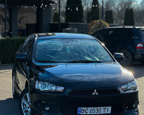 Черный Мицубиси Лансер, объемом двигателя 2 л и пробегом 333 тыс. км за 7300 $, фото 4 на Automoto.ua