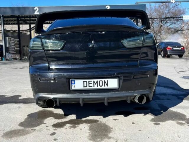 Чорний Міцубісі Lancer, об'ємом двигуна 2 л та пробігом 226 тис. км за 6700 $, фото 3 на Automoto.ua