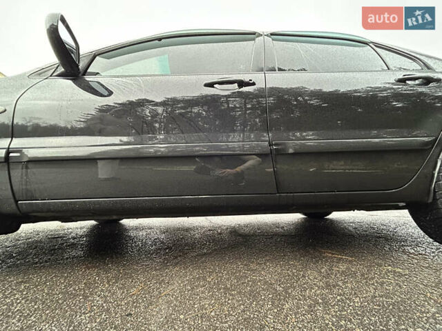 Черный Мицубиси Лансер, объемом двигателя 1.58 л и пробегом 254 тыс. км за 5000 $, фото 11 на Automoto.ua