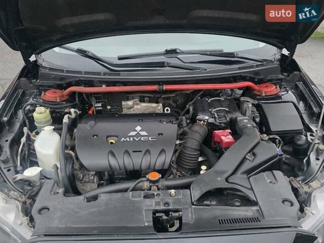 Черный Мицубиси Лансер, объемом двигателя 2 л и пробегом 116 тыс. км за 7200 $, фото 11 на Automoto.ua