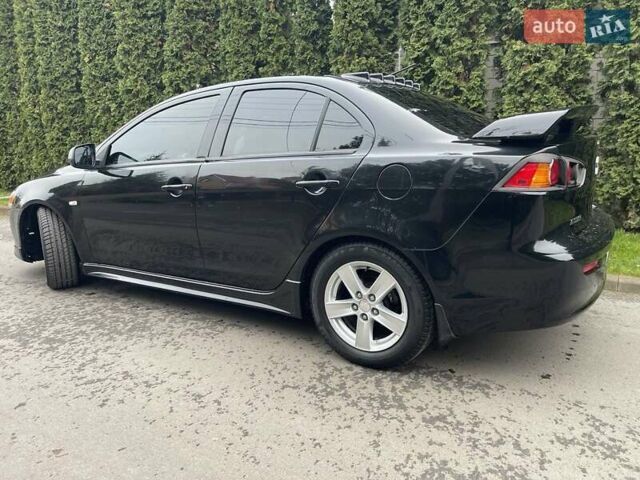 Чорний Міцубісі Lancer, об'ємом двигуна 2 л та пробігом 69 тис. км за 6200 $, фото 9 на Automoto.ua