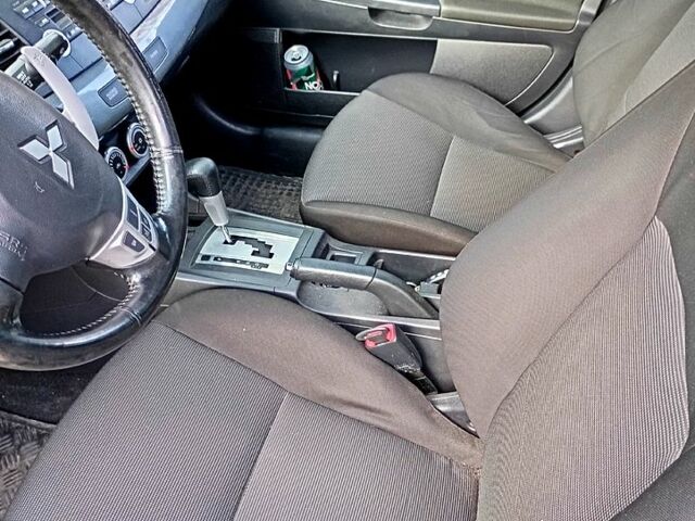 Чорний Міцубісі Lancer, об'ємом двигуна 2 л та пробігом 190 тис. км за 6500 $, фото 5 на Automoto.ua