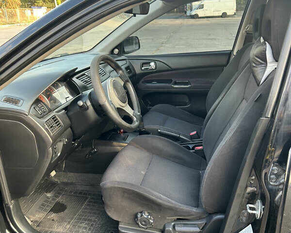 Чорний Міцубісі Lancer, об'ємом двигуна 2 л та пробігом 280 тис. км за 4600 $, фото 39 на Automoto.ua
