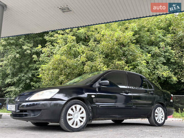 Чорний Міцубісі Lancer, об'ємом двигуна 1.6 л та пробігом 173 тис. км за 3700 $, фото 2 на Automoto.ua