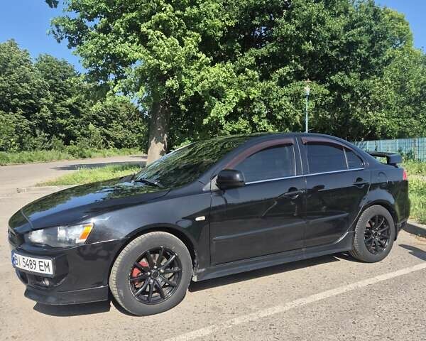 Чорний Міцубісі Lancer, об'ємом двигуна 2 л та пробігом 243 тис. км за 6600 $, фото 11 на Automoto.ua