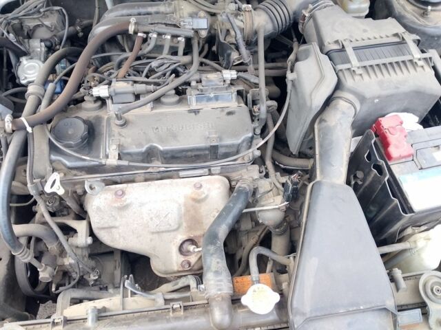 Чорний Міцубісі Lancer, об'ємом двигуна 1.6 л та пробігом 255 тис. км за 5000 $, фото 4 на Automoto.ua