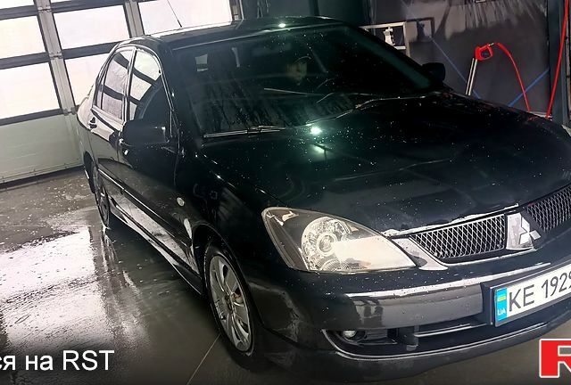 Чорний Міцубісі Lancer, об'ємом двигуна 2 л та пробігом 285 тис. км за 5700 $, фото 6 на Automoto.ua