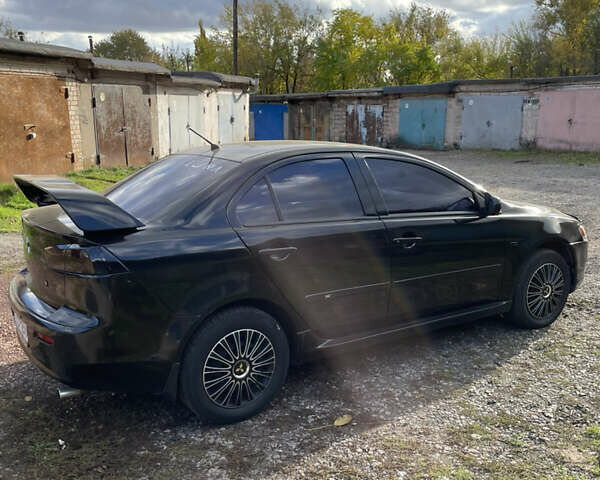 Чорний Міцубісі Lancer, об'ємом двигуна 1.5 л та пробігом 150 тис. км за 6500 $, фото 7 на Automoto.ua