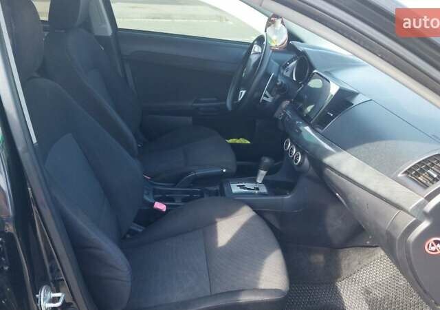 Чорний Міцубісі Lancer, об'ємом двигуна 2 л та пробігом 194 тис. км за 6500 $, фото 15 на Automoto.ua