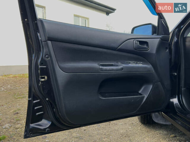 Чорний Міцубісі Lancer, об'ємом двигуна 1.58 л та пробігом 185 тис. км за 3750 $, фото 12 на Automoto.ua