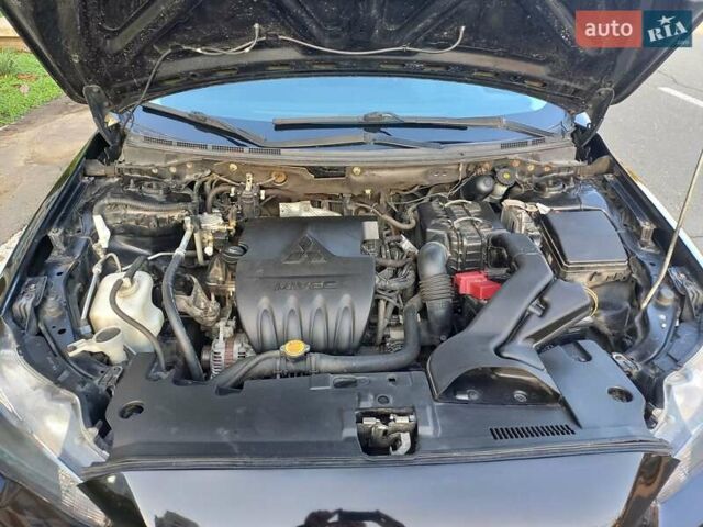 Чорний Міцубісі Lancer, об'ємом двигуна 1.5 л та пробігом 242 тис. км за 5550 $, фото 47 на Automoto.ua