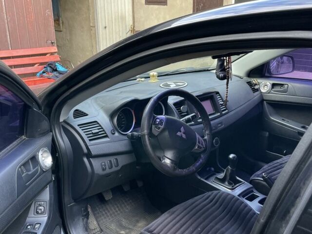 Чорний Міцубісі Lancer, об'ємом двигуна 2 л та пробігом 175 тис. км за 6500 $, фото 9 на Automoto.ua