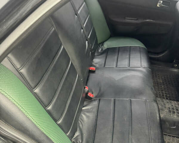 Чорний Міцубісі Lancer, об'ємом двигуна 2 л та пробігом 210 тис. км за 5500 $, фото 21 на Automoto.ua