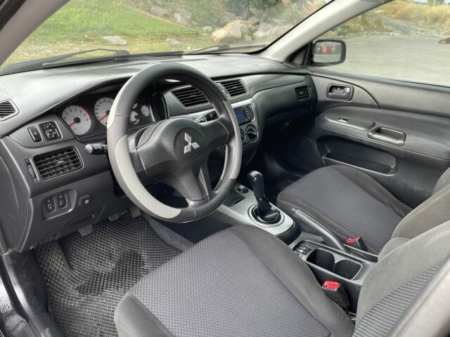 Чорний Міцубісі Lancer, об'ємом двигуна 1.6 л та пробігом 260 тис. км за 4600 $, фото 9 на Automoto.ua