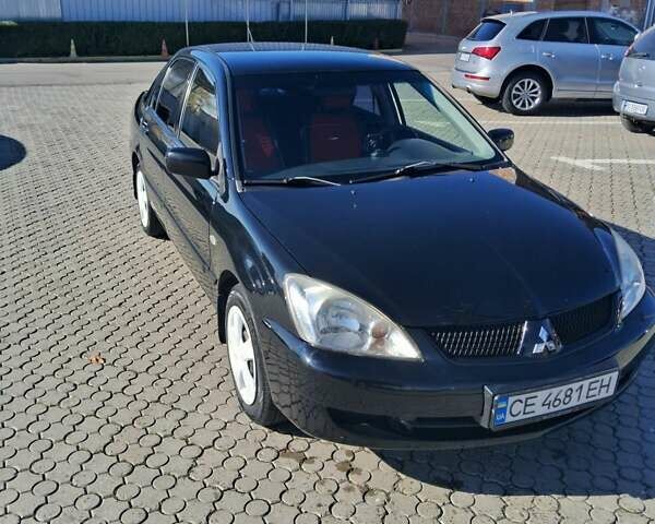 Міцубісі Lancer 2007 у Чернівцях на Automoto.ua Чорний Міцубісі Lancer, об'ємом двигуна 1.58 л та пробігом 247 тис. км за 4300 $, фото 1 на Automoto.ua