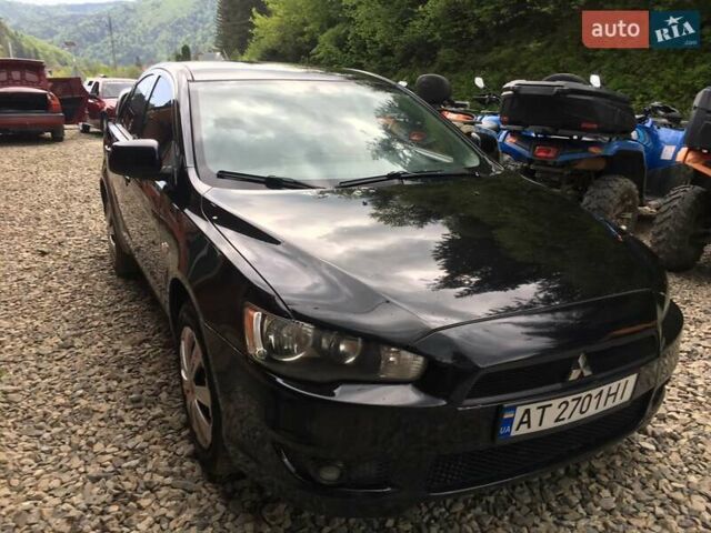 Черный Мицубиси Лансер, объемом двигателя 1.5 л и пробегом 240 тыс. км за 6900 $, фото 24 на Automoto.ua