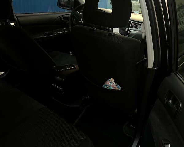 Черный Мицубиси Лансер, объемом двигателя 1.6 л и пробегом 180 тыс. км за 3499 $, фото 13 на Automoto.ua