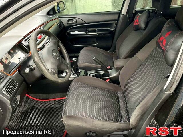 Чорний Міцубісі Lancer, об'ємом двигуна 1.6 л та пробігом 196 тис. км за 3900 $, фото 5 на Automoto.ua