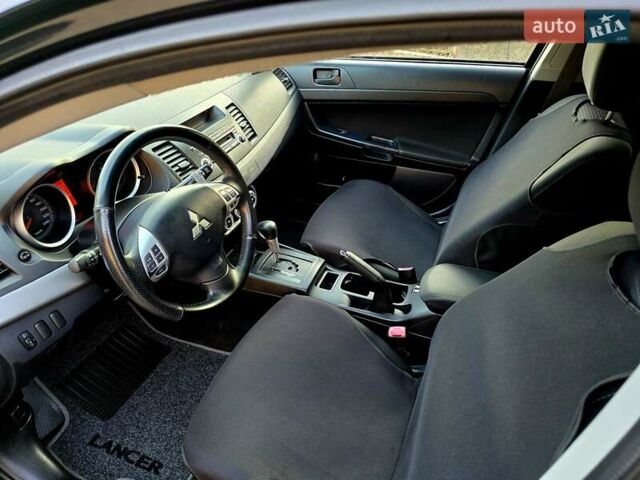 Чорний Міцубісі Lancer, об'ємом двигуна 2 л та пробігом 260 тис. км за 6555 $, фото 23 на Automoto.ua