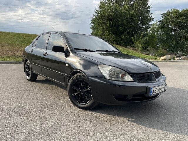 Чорний Міцубісі Lancer, об'ємом двигуна 1.6 л та пробігом 260 тис. км за 4600 $, фото 3 на Automoto.ua