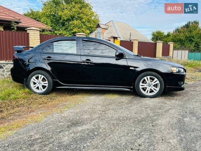 Чорний Міцубісі Lancer, об'ємом двигуна 2 л та пробігом 284 тис. км за 6200 $, фото 12 на Automoto.ua
