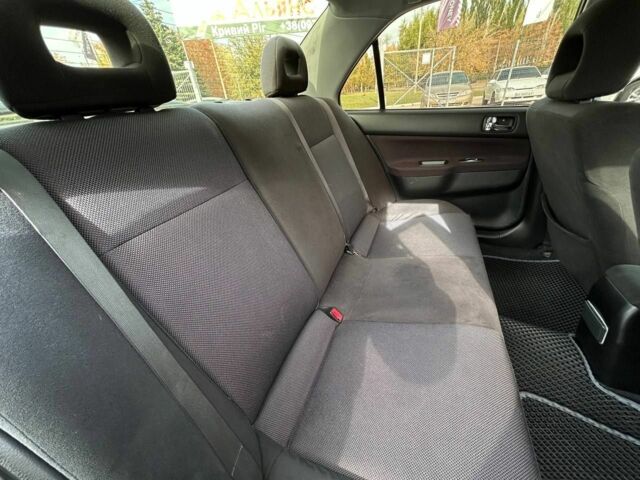 Мицубиси Лансер 2007 в Кривом Роге на Automoto.ua Черный Мицубиси Лансер, объемом двигателя 2 л и пробегом 143 тыс. км за 5400 $, фото 18 на Automoto.ua