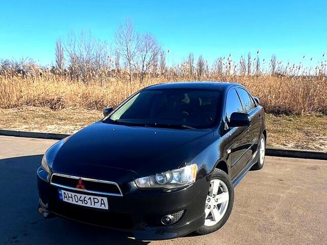 Чорний Міцубісі Lancer, об'ємом двигуна 2 л та пробігом 196 тис. км за 7500 $, фото 1 на Automoto.ua