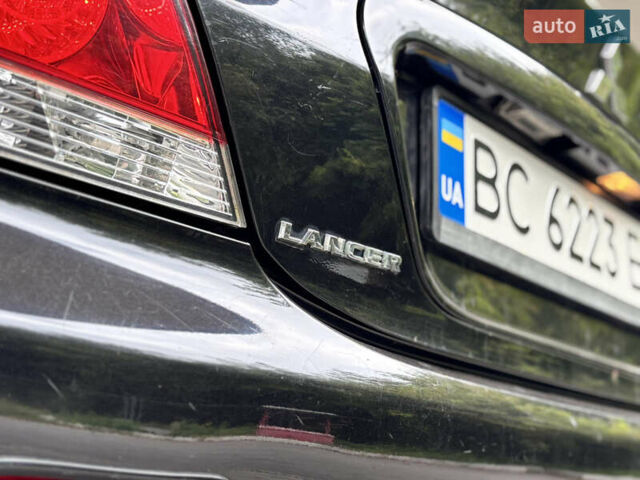Чорний Міцубісі Lancer, об'ємом двигуна 1.6 л та пробігом 173 тис. км за 3700 $, фото 11 на Automoto.ua