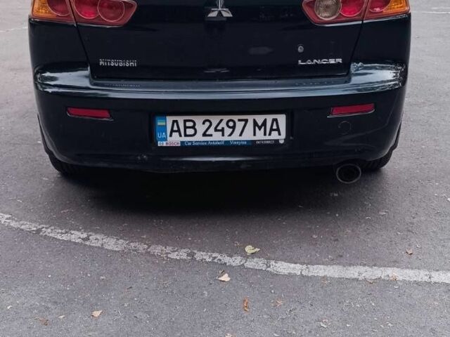 Черный Мицубиси Лансер, объемом двигателя 2 л и пробегом 210 тыс. км за 6000 $, фото 8 на Automoto.ua