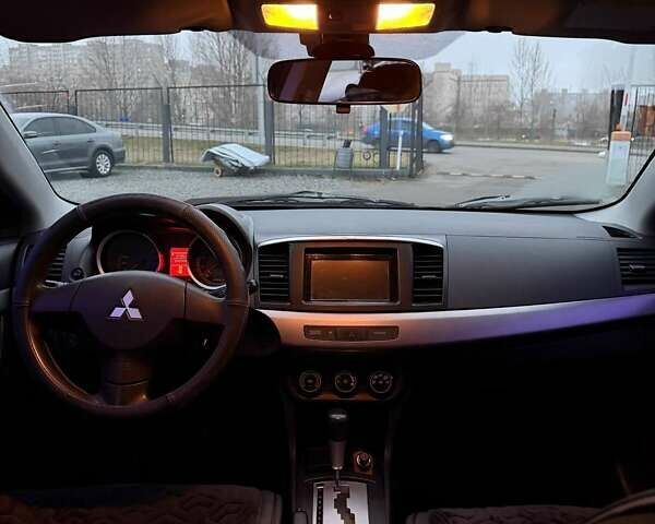 Черный Мицубиси Лансер, объемом двигателя 1.5 л и пробегом 245 тыс. км за 4499 $, фото 8 на Automoto.ua
