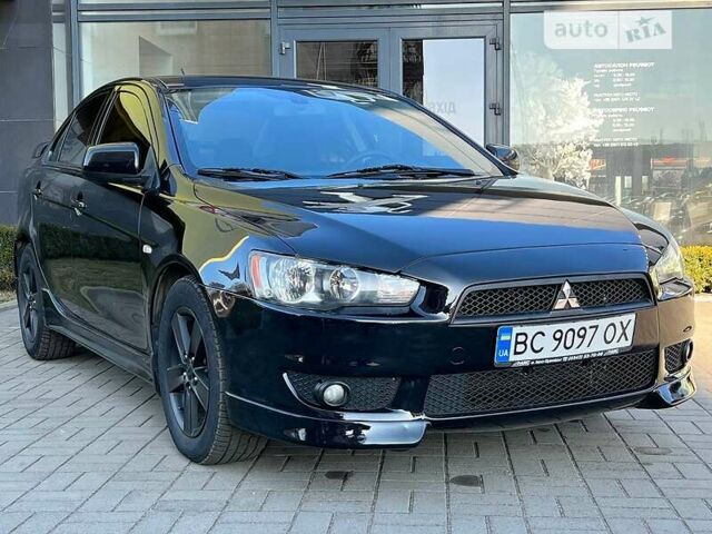 Чорний Міцубісі Lancer, об'ємом двигуна 2 л та пробігом 215 тис. км за 6400 $, фото 39 на Automoto.ua