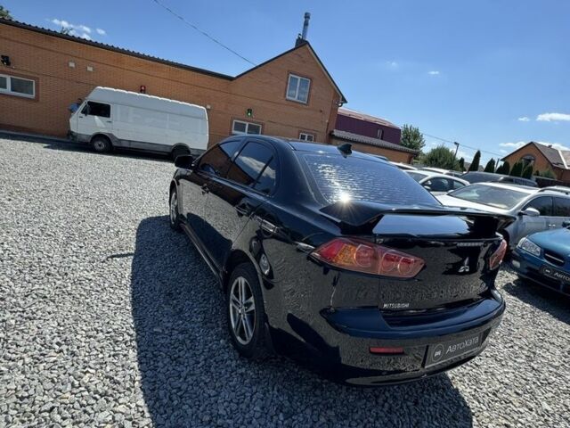 Чорний Міцубісі Lancer, об'ємом двигуна 2 л та пробігом 253 тис. км за 6400 $, фото 4 на Automoto.ua