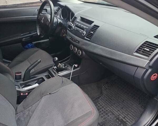 Чорний Міцубісі Lancer, об'ємом двигуна 2 л та пробігом 273 тис. км за 7100 $, фото 6 на Automoto.ua