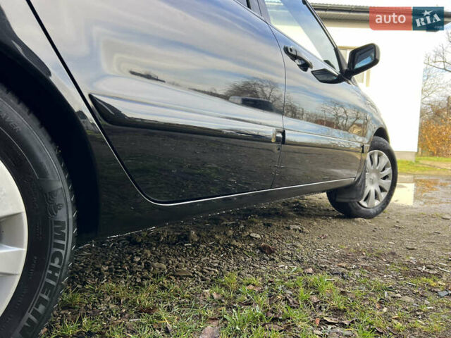 Чорний Міцубісі Lancer, об'ємом двигуна 1.58 л та пробігом 185 тис. км за 3750 $, фото 6 на Automoto.ua