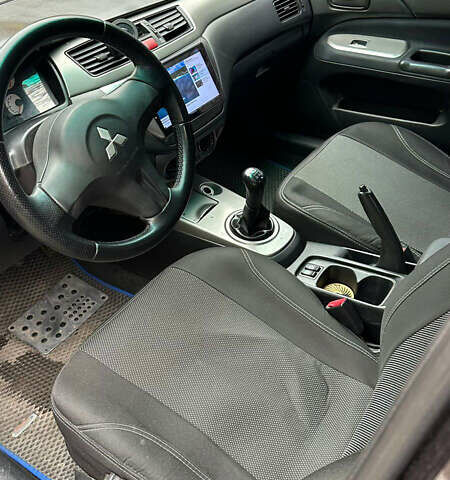 Чорний Міцубісі Lancer, об'ємом двигуна 1.59 л та пробігом 300 тис. км за 3400 $, фото 7 на Automoto.ua