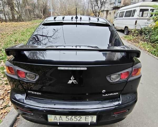 Чорний Міцубісі Lancer, об'ємом двигуна 2 л та пробігом 68 тис. км за 5500 $, фото 2 на Automoto.ua