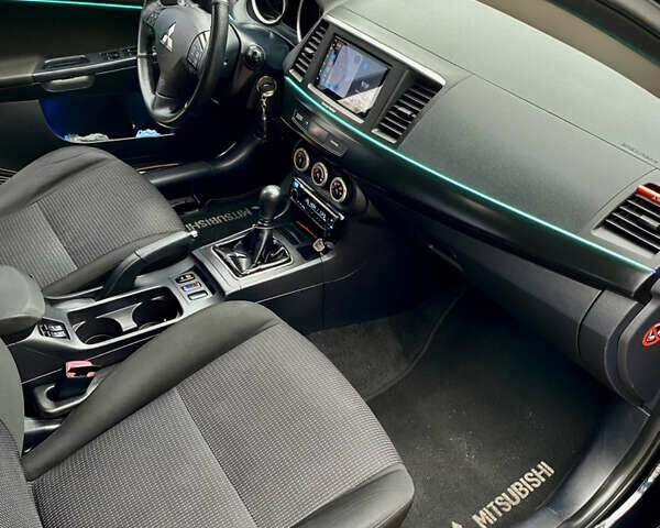 Черный Мицубиси Лансер, объемом двигателя 2 л и пробегом 164 тыс. км за 8300 $, фото 20 на Automoto.ua