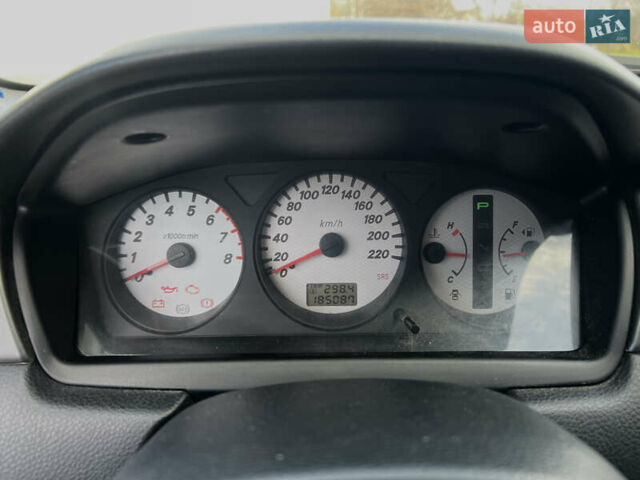 Чорний Міцубісі Lancer, об'ємом двигуна 1.58 л та пробігом 185 тис. км за 3750 $, фото 18 на Automoto.ua