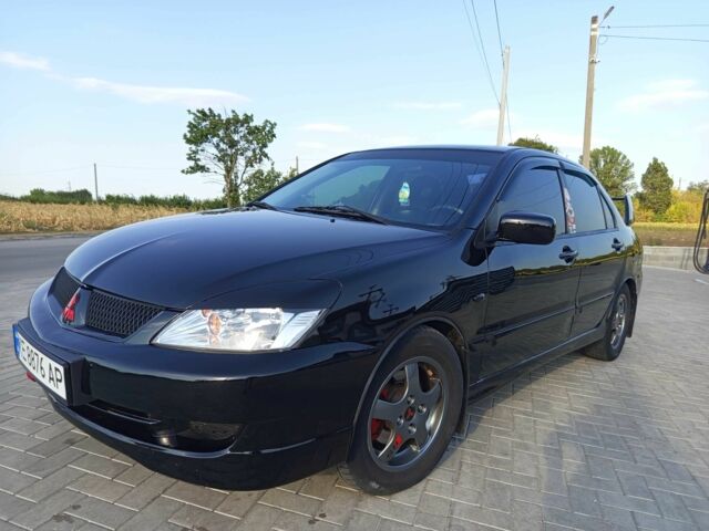 Чорний Міцубісі Lancer, об'ємом двигуна 1.6 л та пробігом 3 тис. км за 4500 $, фото 2 на Automoto.ua