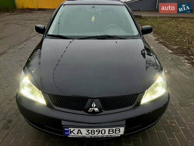 Чорний Міцубісі Lancer, об'ємом двигуна 1.6 л та пробігом 303 тис. км за 4350 $, фото 30 на Automoto.ua