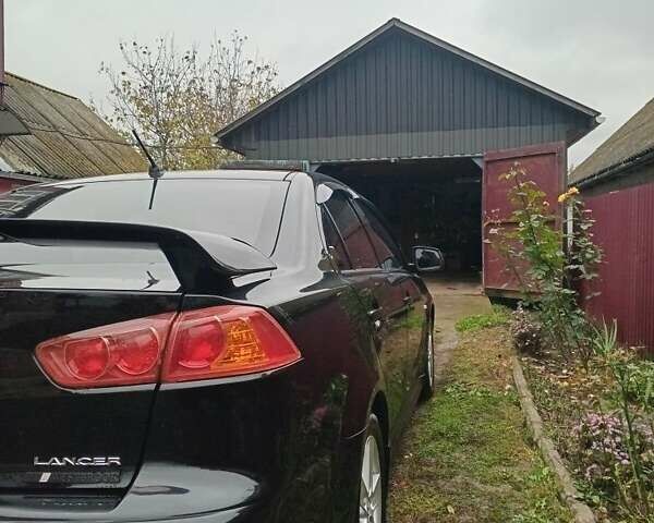 Чорний Міцубісі Lancer, об'ємом двигуна 2 л та пробігом 273 тис. км за 7100 $, фото 3 на Automoto.ua
