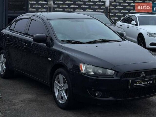 Черный Мицубиси Лансер, объемом двигателя 1.5 л и пробегом 245 тыс. км за 4499 $, фото 1 на Automoto.ua