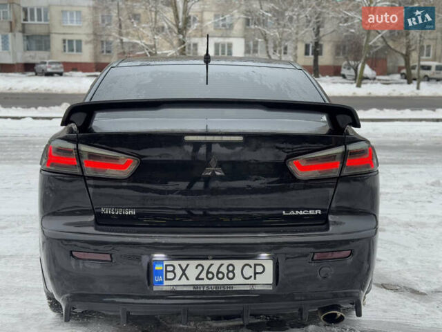 Черный Мицубиси Лансер, объемом двигателя 2 л и пробегом 215 тыс. км за 6600 $, фото 6 на Automoto.ua