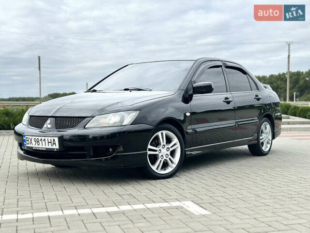 Чорний Міцубісі Lancer, об'ємом двигуна 2 л та пробігом 275 тис. км за 5300 $, фото 9 на Automoto.ua