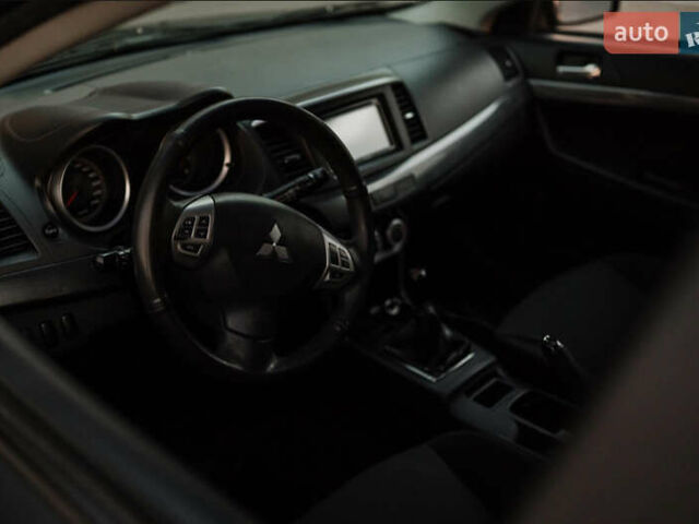 Чорний Міцубісі Lancer, об'ємом двигуна 2 л та пробігом 203 тис. км за 7000 $, фото 7 на Automoto.ua