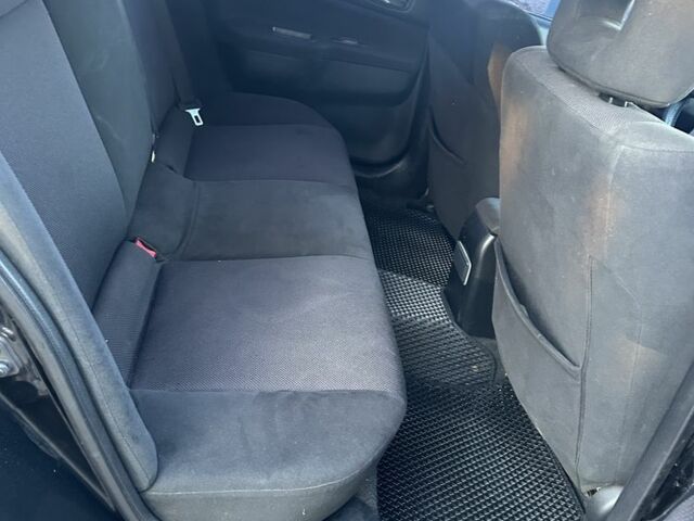 Черный Мицубиси Лансер, объемом двигателя 2 л и пробегом 300 тыс. км за 3999 $, фото 6 на Automoto.ua